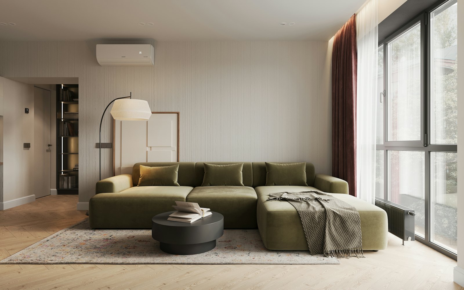 Living room with an olive corner sofa in soft daylight